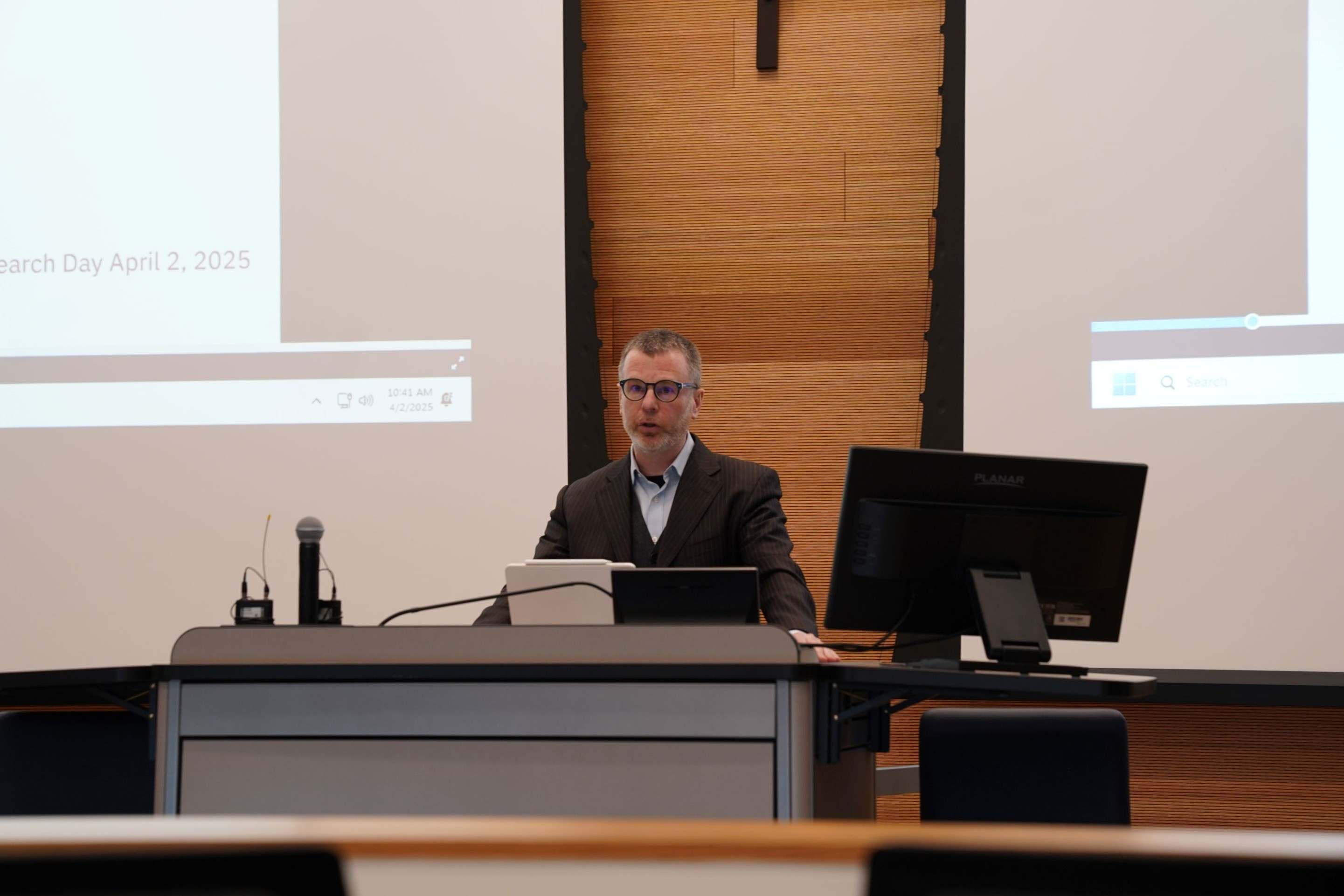Professor Jason Montgomery presenting in Conway 110